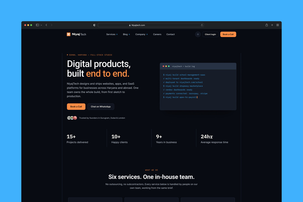 NiyajTech redesigned homepage hero with a live build-log terminal